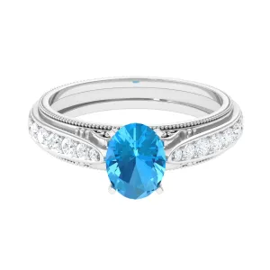 8X6 MM Oval Cut Swiss Blue Topaz Solitaire and Diamond Side Stone Ring