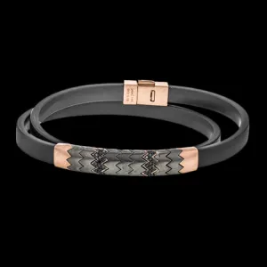 For the fashionable man this contemporary men's bracelet of black rubber has a zig zag design in titanium and rose gold, and highlighted by 0.19 ctw of black diamonds